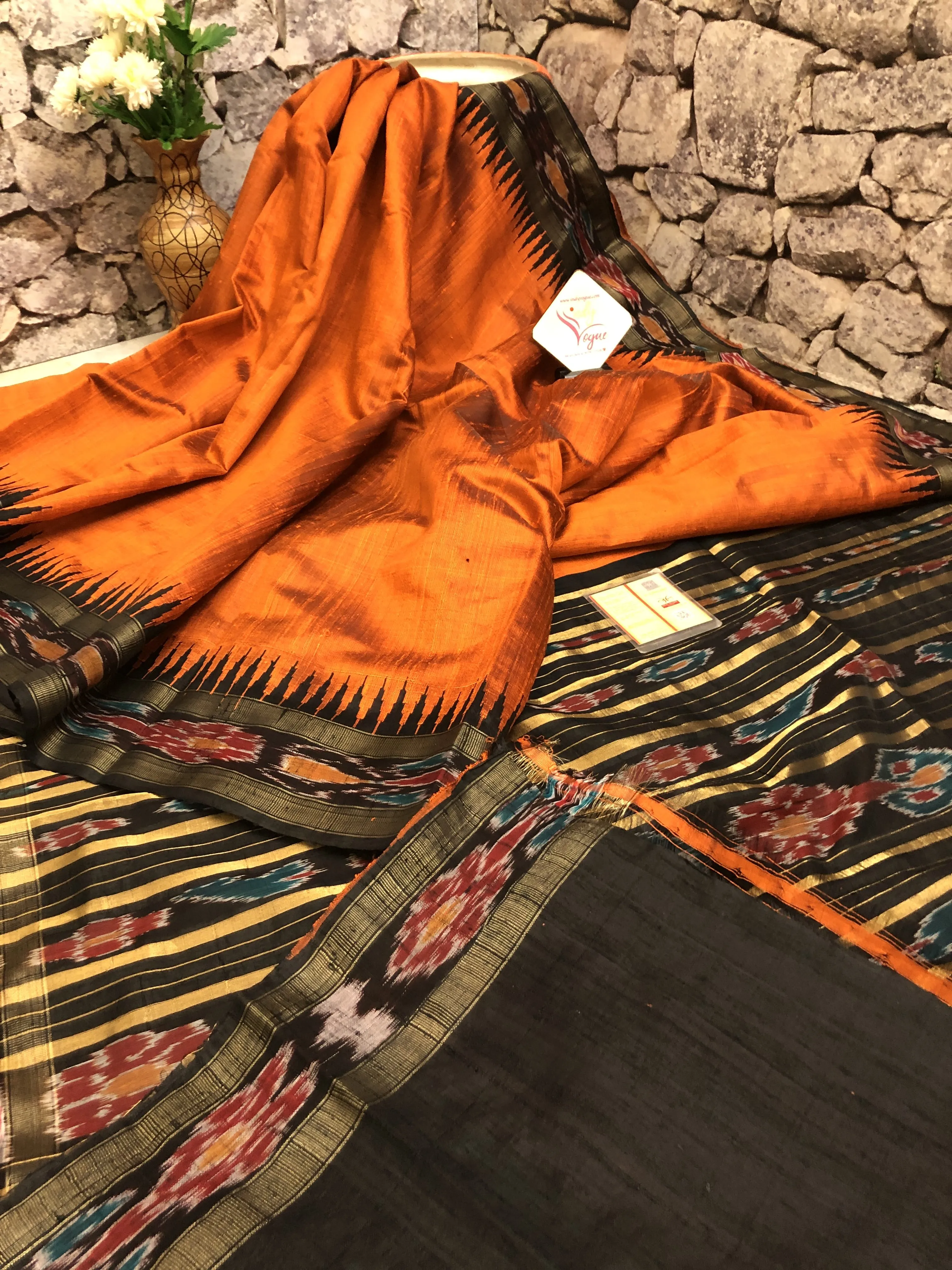 Burnt Orange Color Raw Silk Saree with Ikat Pallu and Border