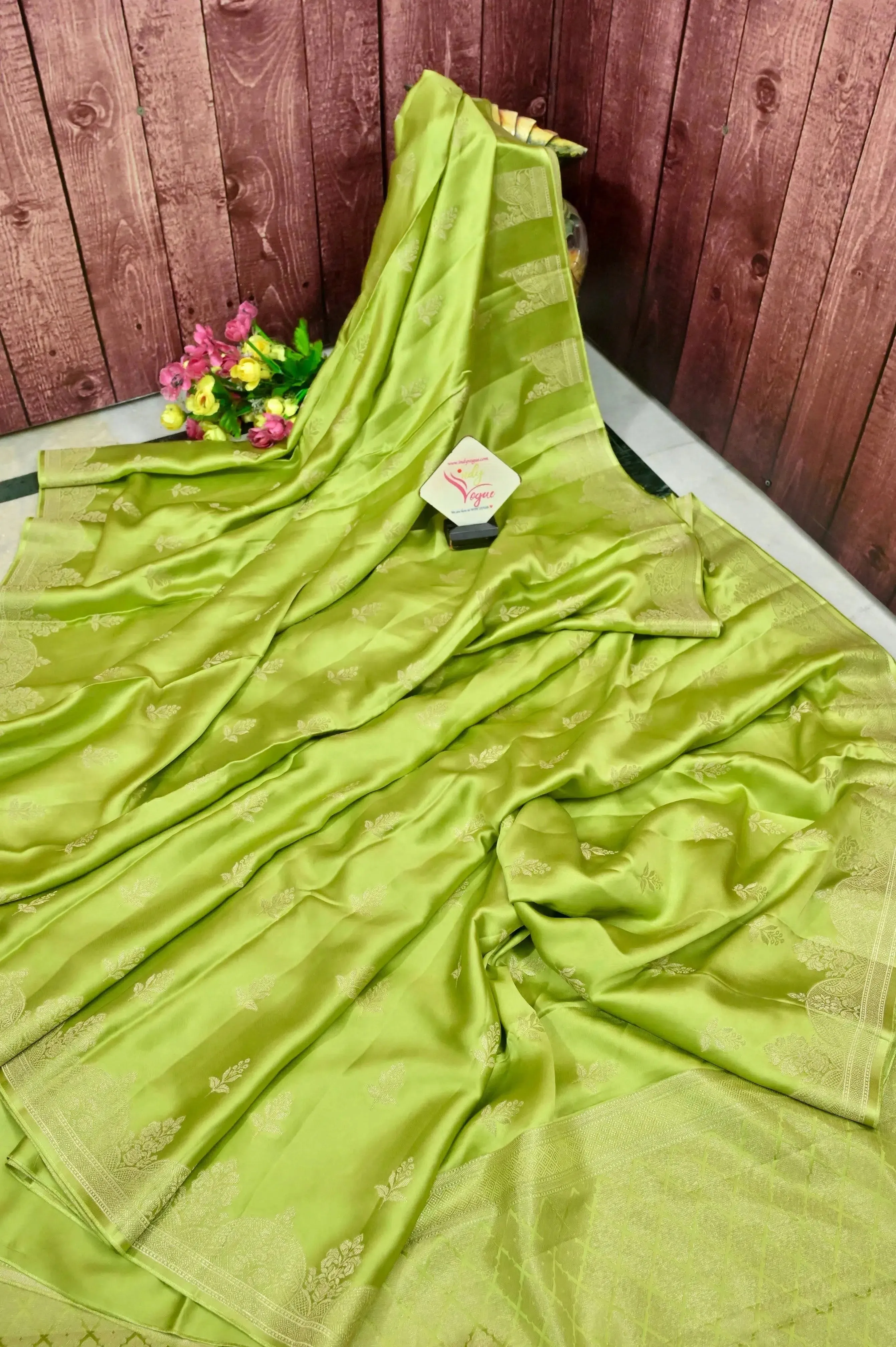 Leaf Green Color Mashru Banarasi Saree with Silver Zari Work