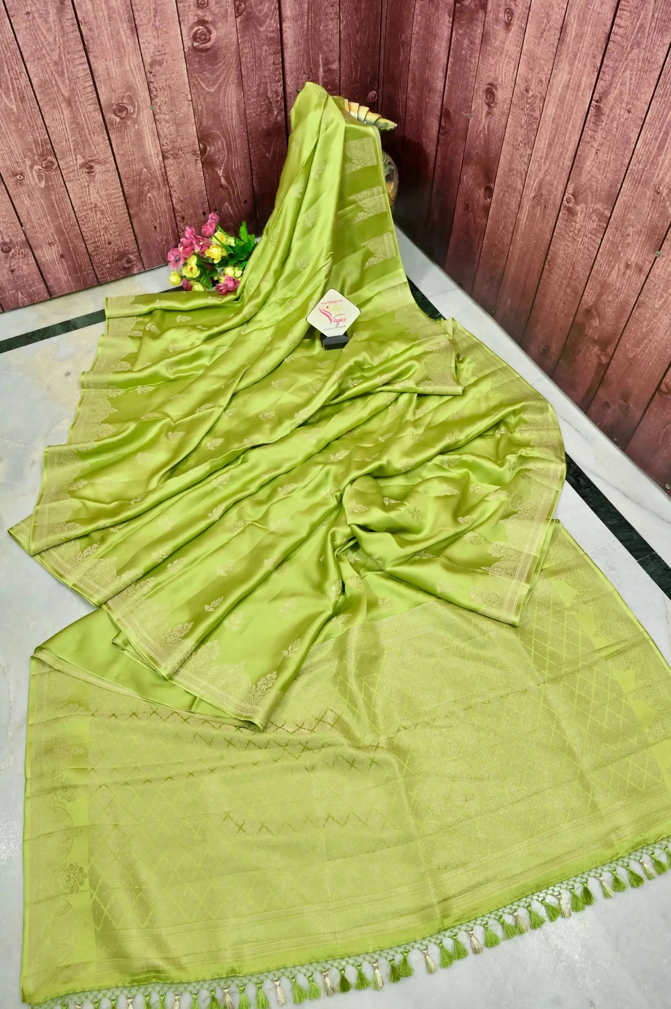 Leaf Green Color Mashru Banarasi Saree with Silver Zari Work