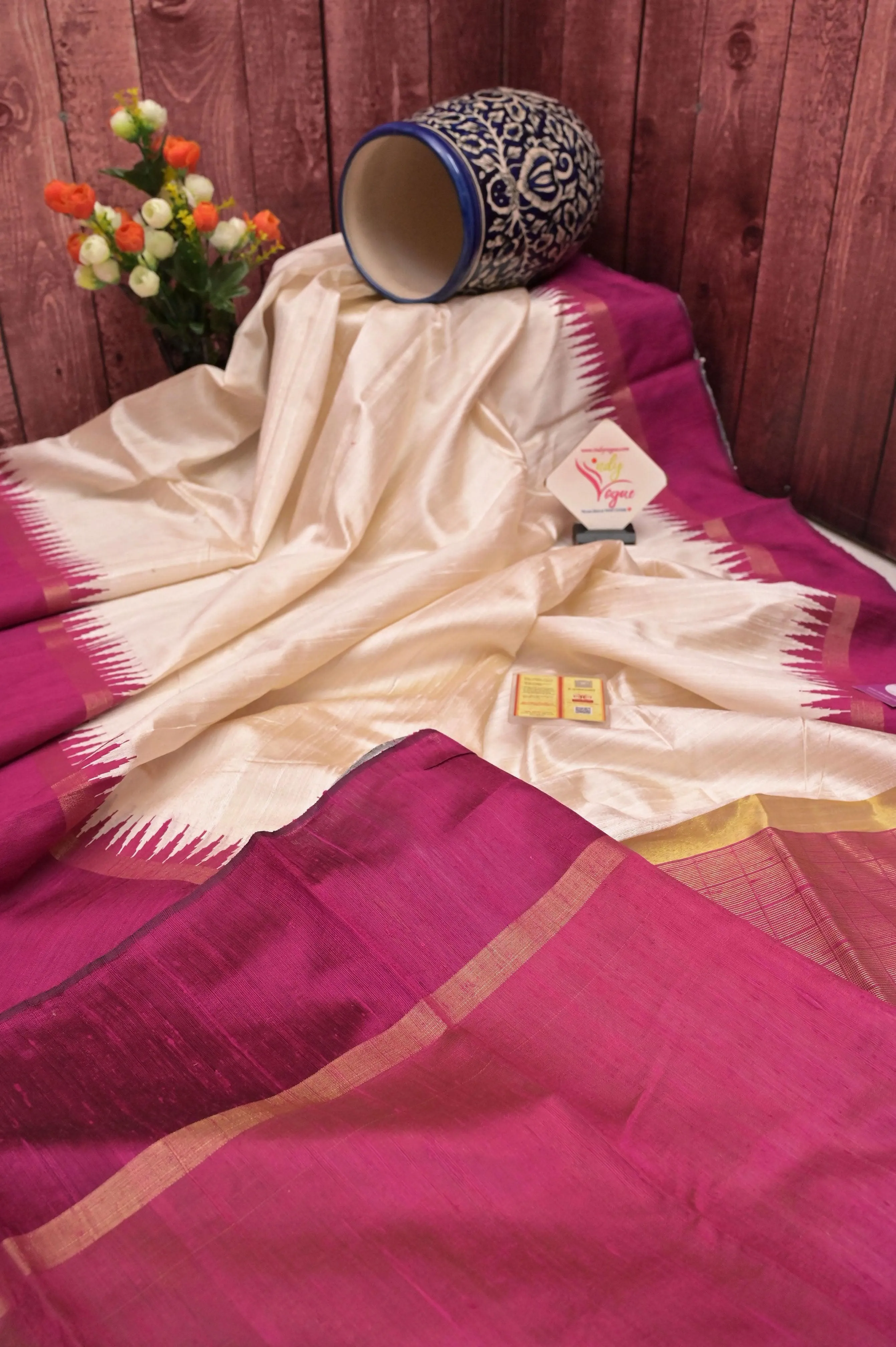 Offwhite and Dark Meganta Color Pure Raw Silk Saree with Temple Border